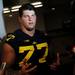 Michigan offensive linesman Taylor Lewan answers questions in the locker room during media day at Michigan Stadium on Sunday, August 11, 2013. Melanie Maxwell | AnnArbor.com